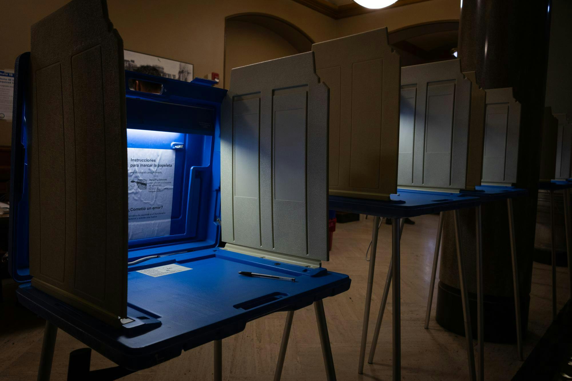 A blue voting booth.