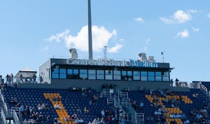 A photo of two seated sections in Centreville Bank Stadium against a relatively clear, blue sky. The seats are navy blue. A photo of two seated sections in Centreville Bank Stadium against a relatively clear, blue sky. The seats are navy blue.