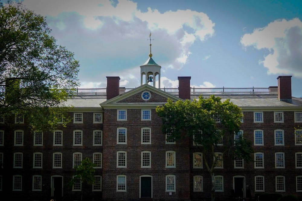 Photo of University Hall with clouds in the background. 