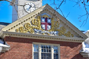 Photo of the Brown University logo on the roof of Wayland Hall.