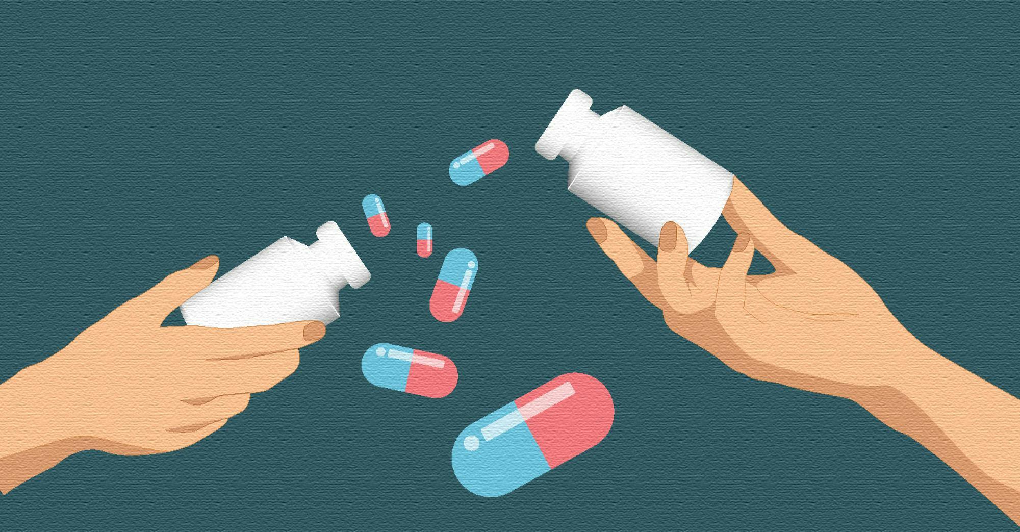 Two hands holding pill bottles and some pills flying around.