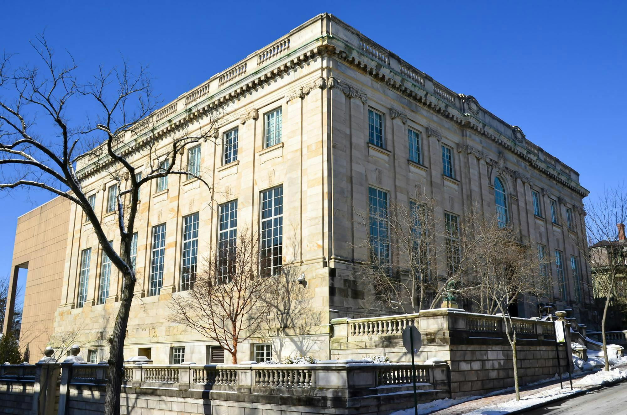 A photo of the John Hay Library from College Street.