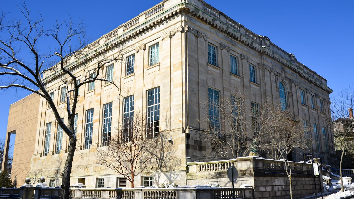 A photo of the John Hay Library from College Street.
