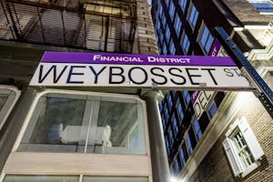 A photo of a street sign Weybosset Street in Providence's financial district. 