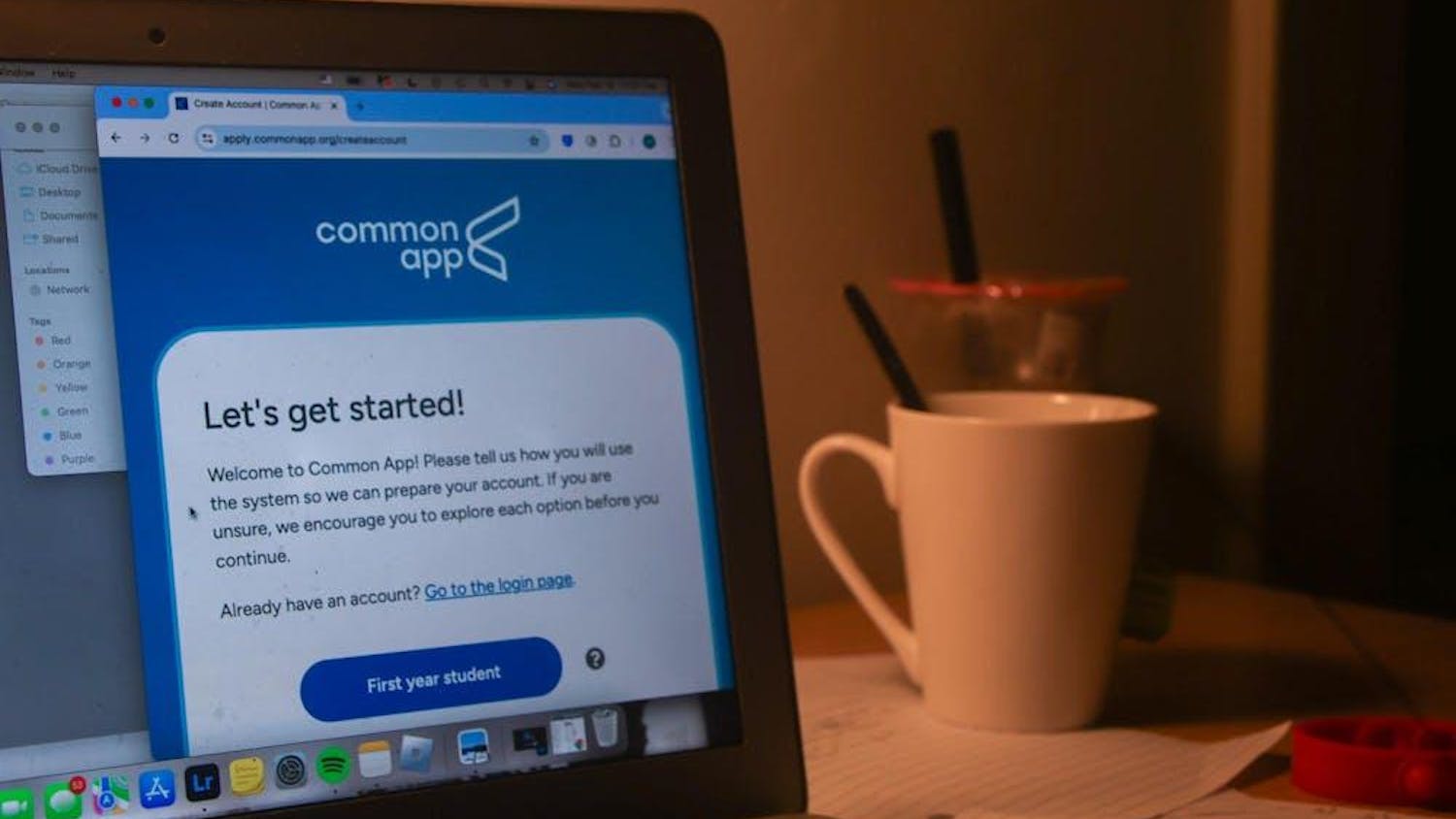 An open laptop displaying the Common App webpage.