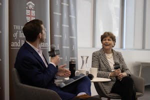 A photo of John Friedman and Jeanne Shaheen speaking at the Watson Center for International and Public Affairs.