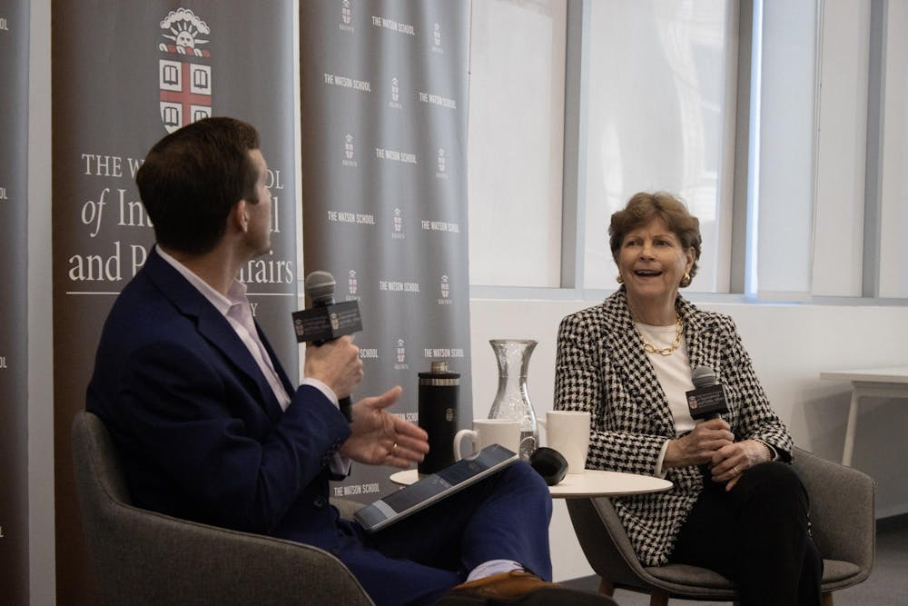 A photo of John Friedman and Jeanne Shaheen speaking at the Watson Center for International and Public Affairs.