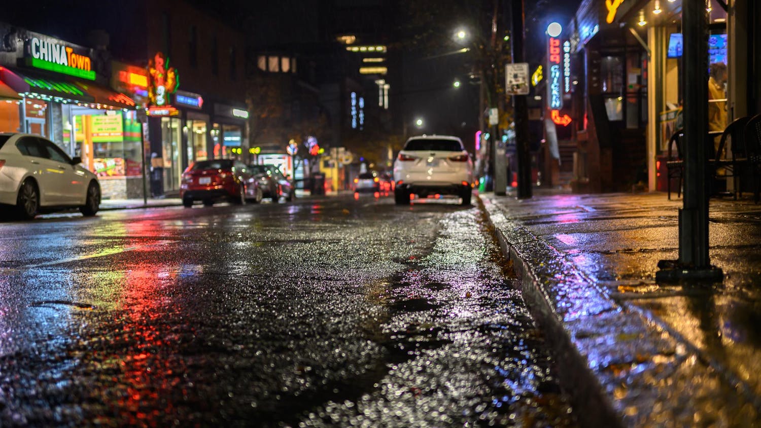 Photo of a rainy street at night.