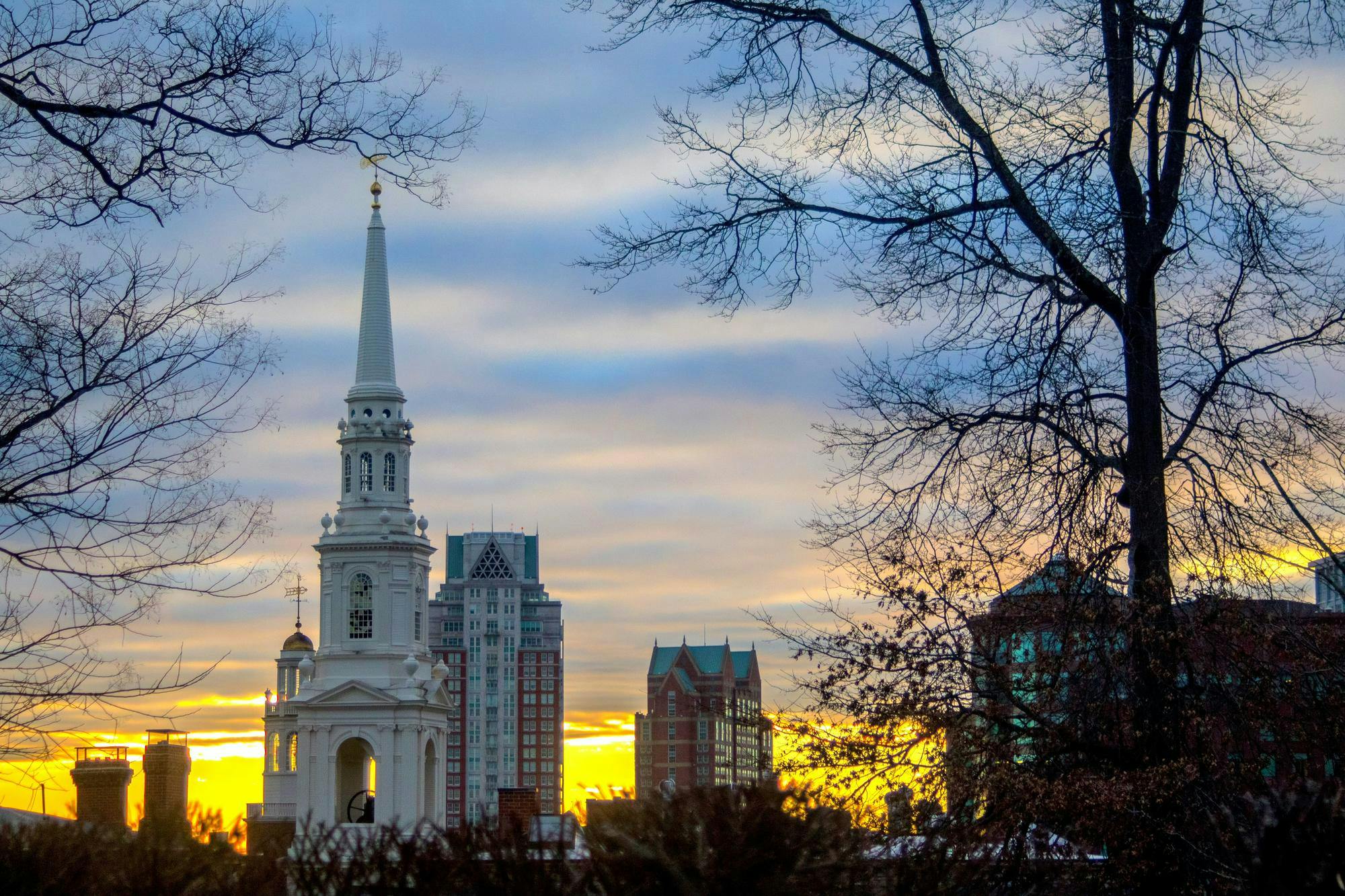Image of the Providence skyline while the sun is setting. 