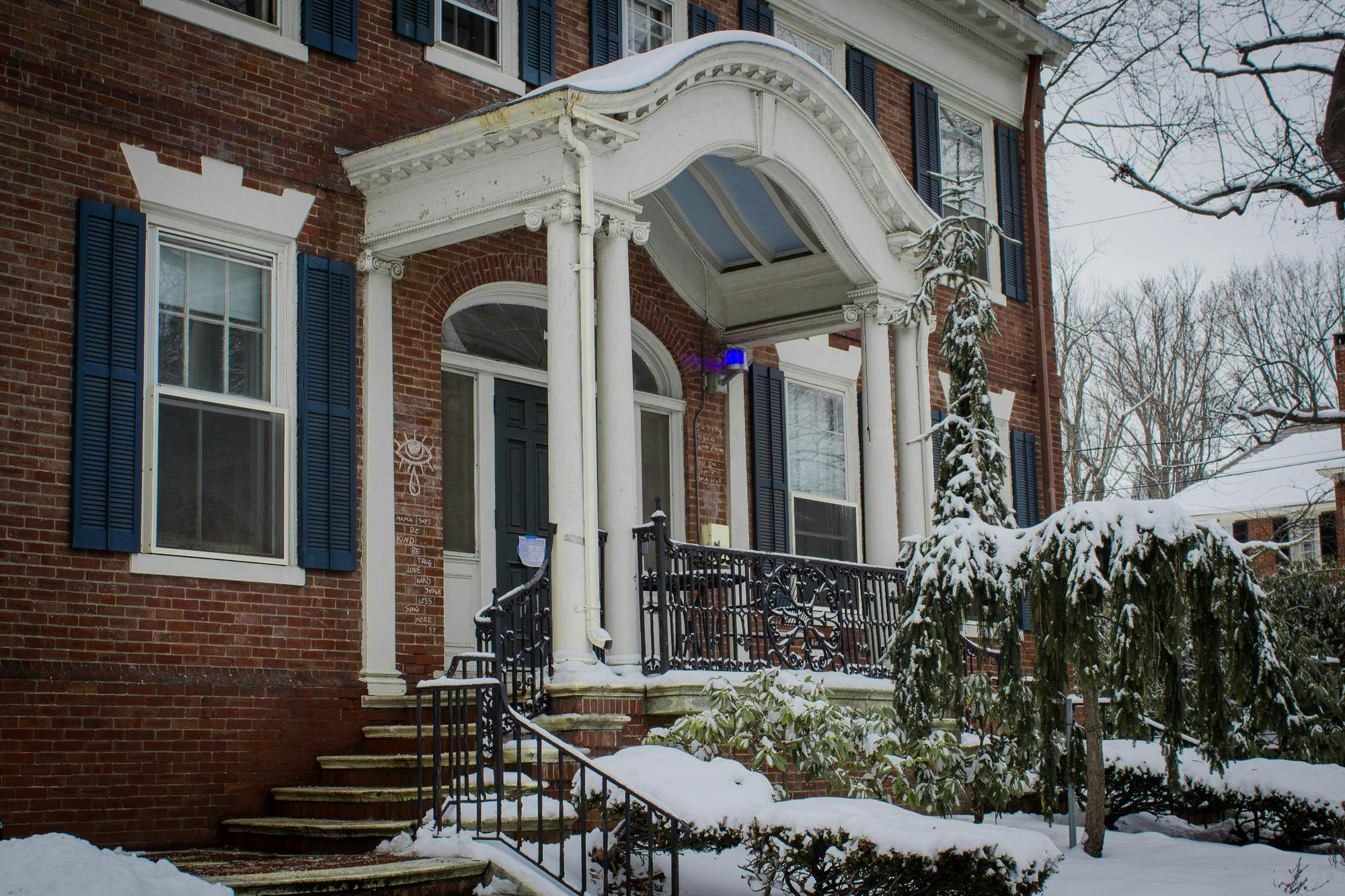 A picture of the entrance to King House on a snowy day.