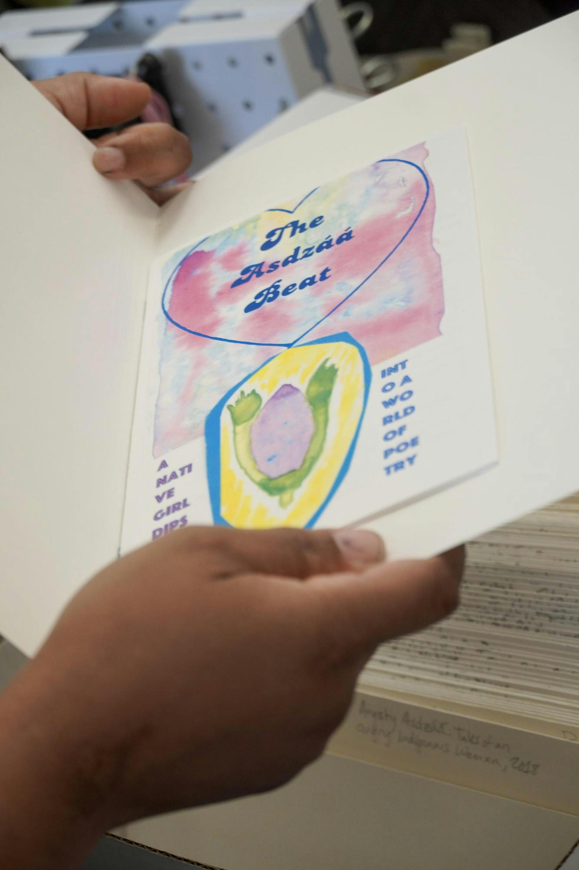 A drawing in a yellow folder.