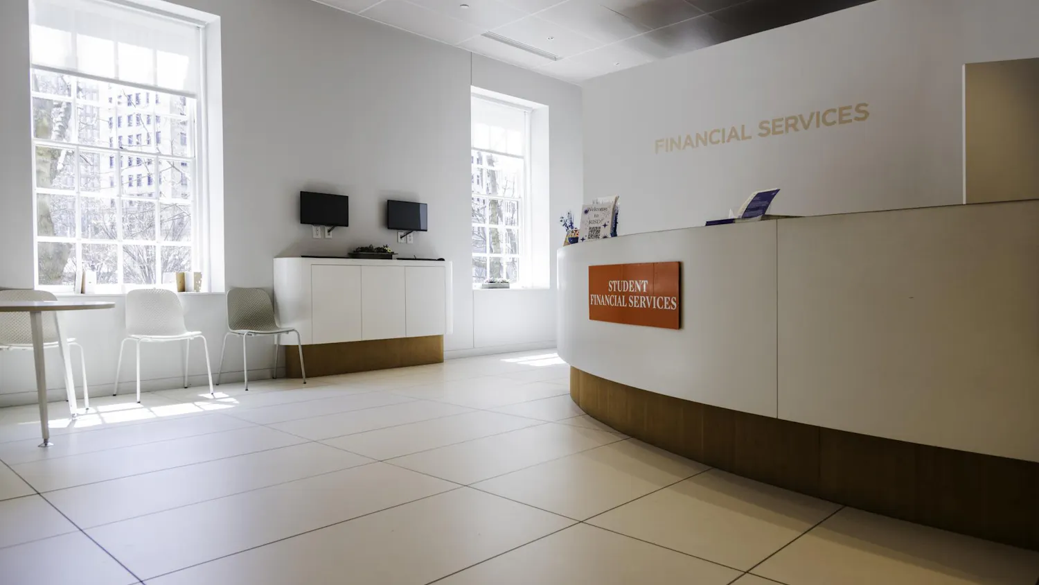 A photograph of the interior lobby of the RISD student financial services office.