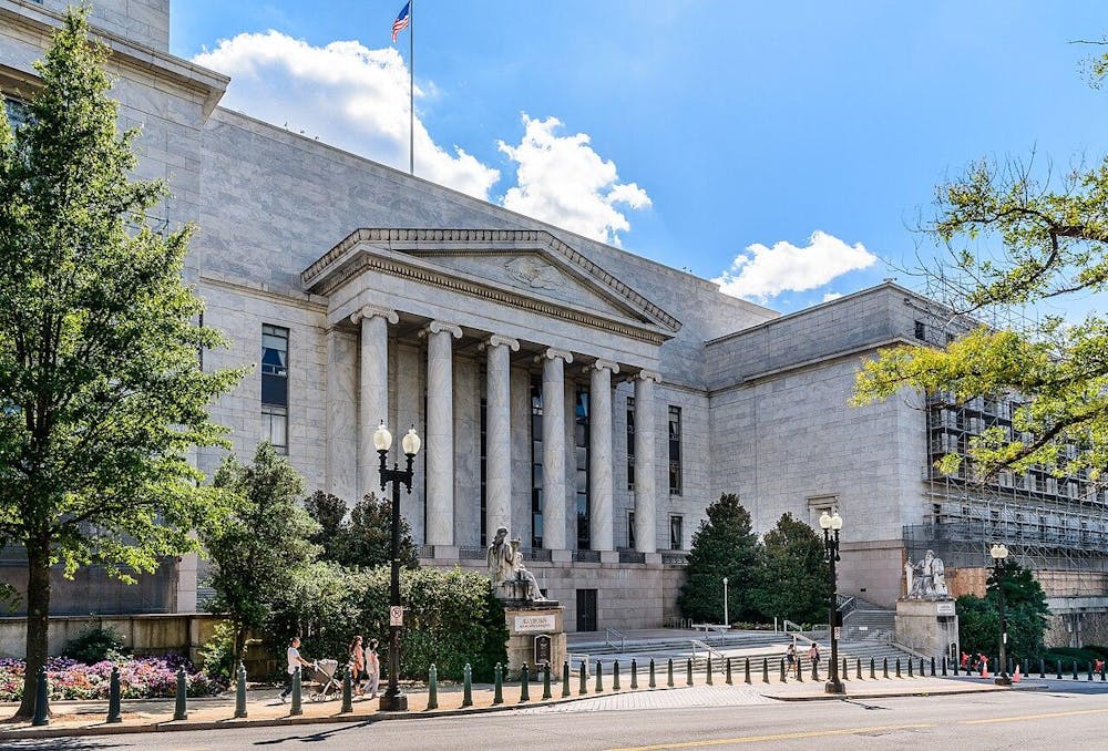 A photo of the Rayburn House Office Building in Washington, DC on a sunny day.