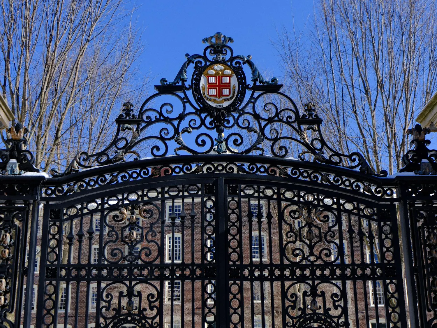 A photo of the Van Wickle Gates covered in snow.