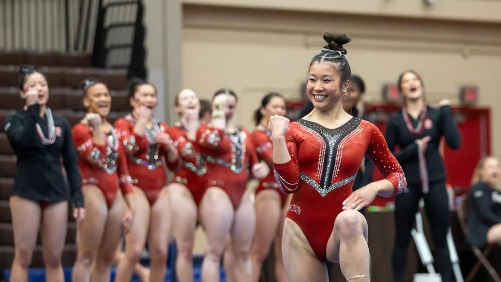 <p>&nbsp;Julia Bedell ’25 smiles as she flawlessly lands her floor routine.</p><p>Courtesy of Chip DeLorenzo via Brown Athletics</p>