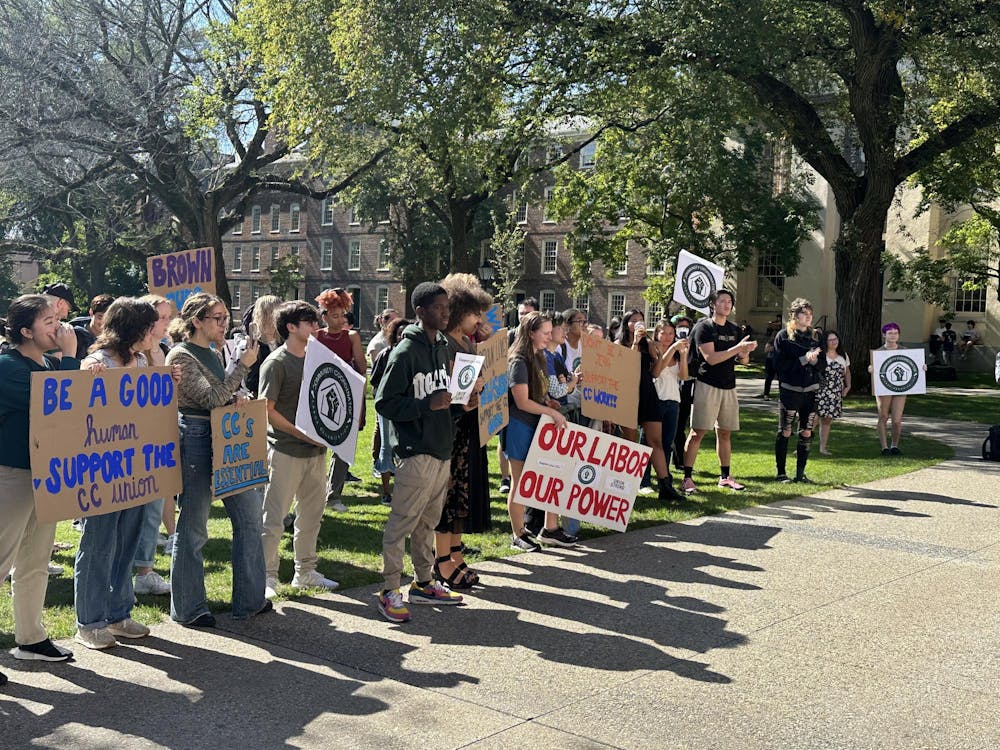 Community Coordinators held a rally on the Main Green on Tuesday. The University intends to voluntarily recognize the union, pending a review of authorization cards.
