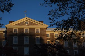 A photo of University Hall bathed in late afternoon light.