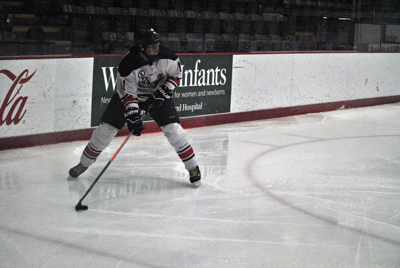 Rowland_w-hockey_tom-sullivan