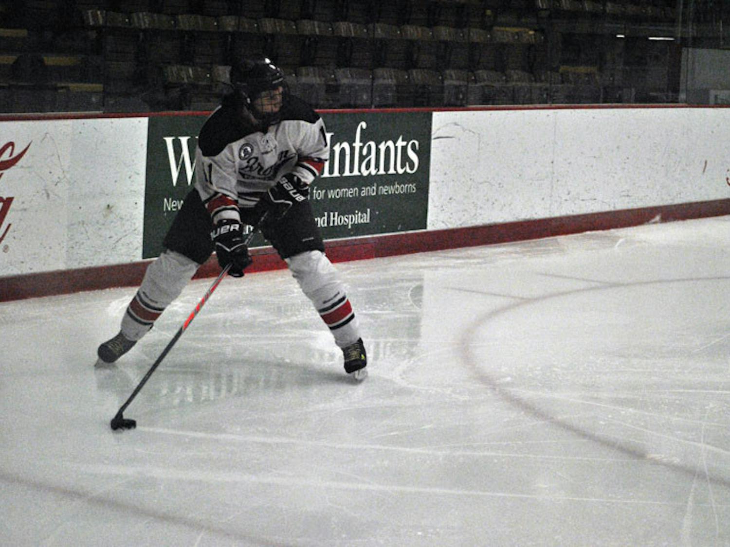 Rowland_w-hockey_tom-sullivan