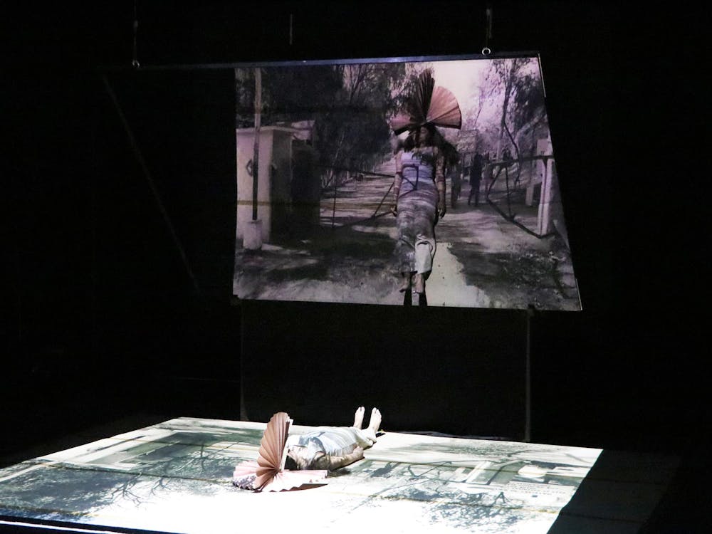 <p>The mirror technique was also projected onto the floor in order to allow performers to contribute to the illusion both behind and in front of the mirror.</p><p>Courtesy of Brown Arts Institute</p>