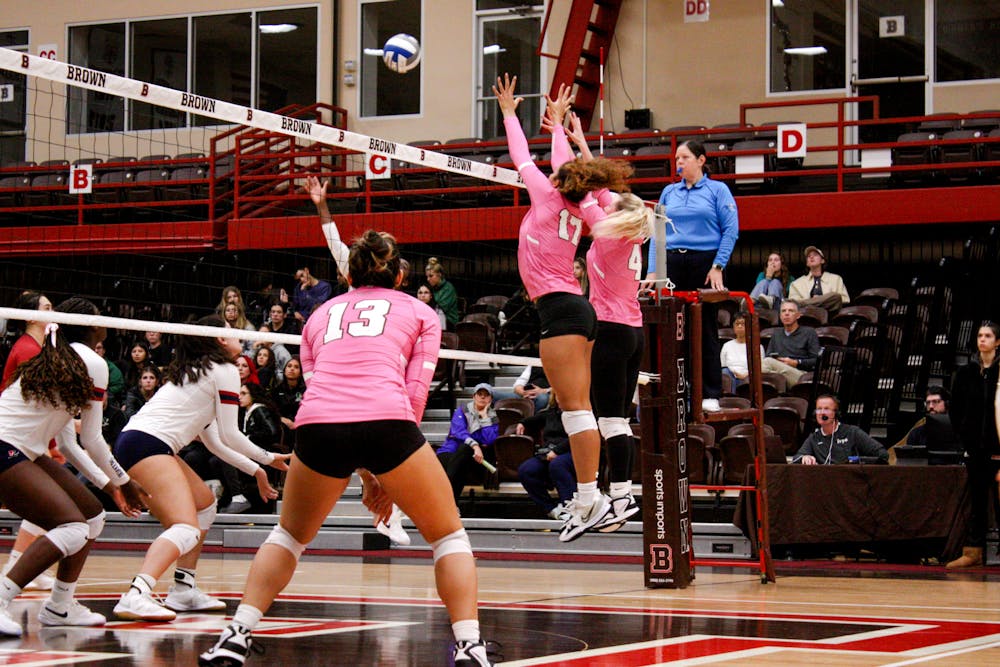 Beau Vanderlaan ’25 and Cierra Jenkins ’24 combined for a key block late in the second set against Penn. 