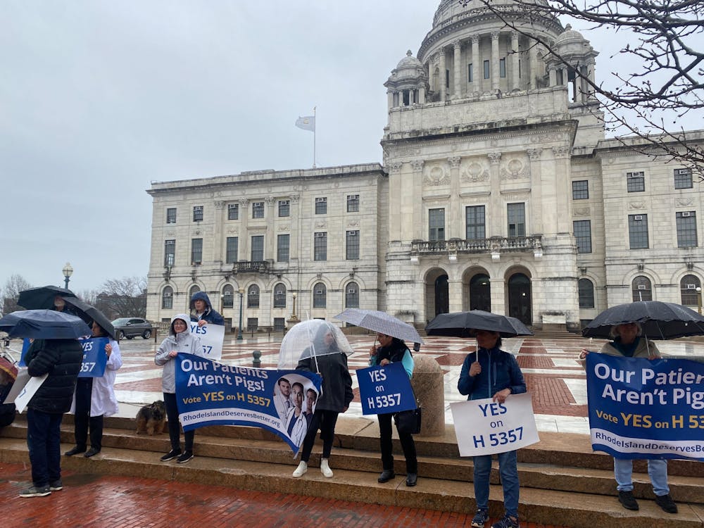 Throughout the day, protestors circled Brown’s campus, Rhode Island Hospital and the State House, driving in trucks with flashing lights and billboards reading “Our Patients aren’t Pigs! Vote YES on H5357.”