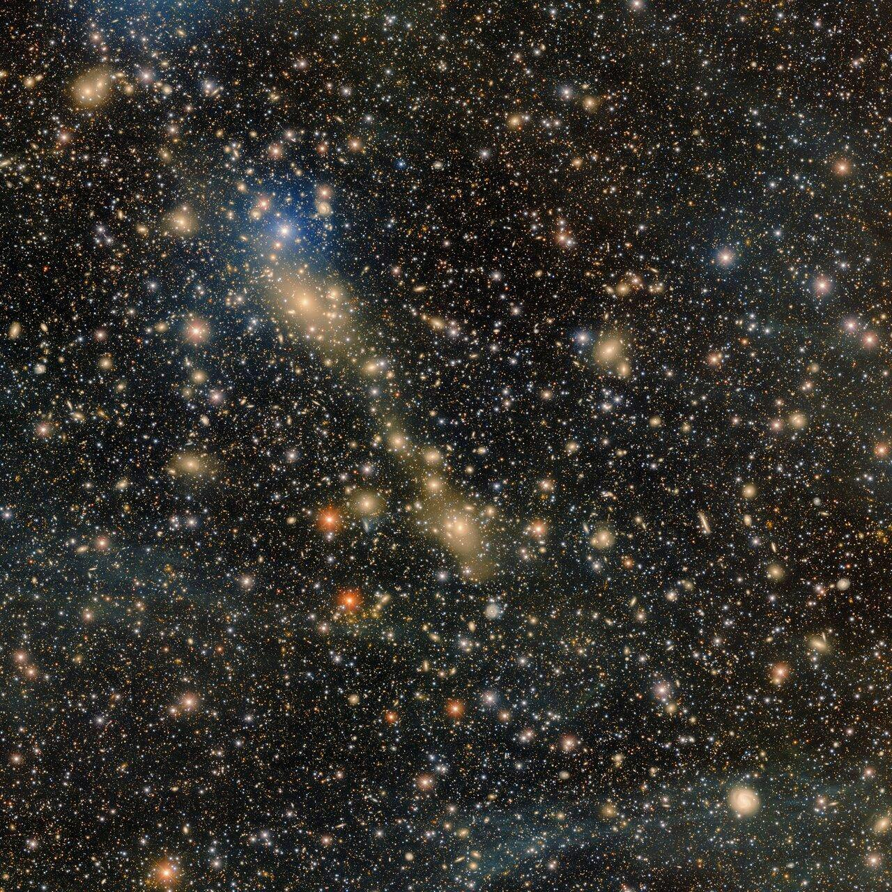 A photo of Abell 3667, an actively merging galaxy cluster, taken by a telescope mounted at Cerro Tololo Inter-American Observatory.