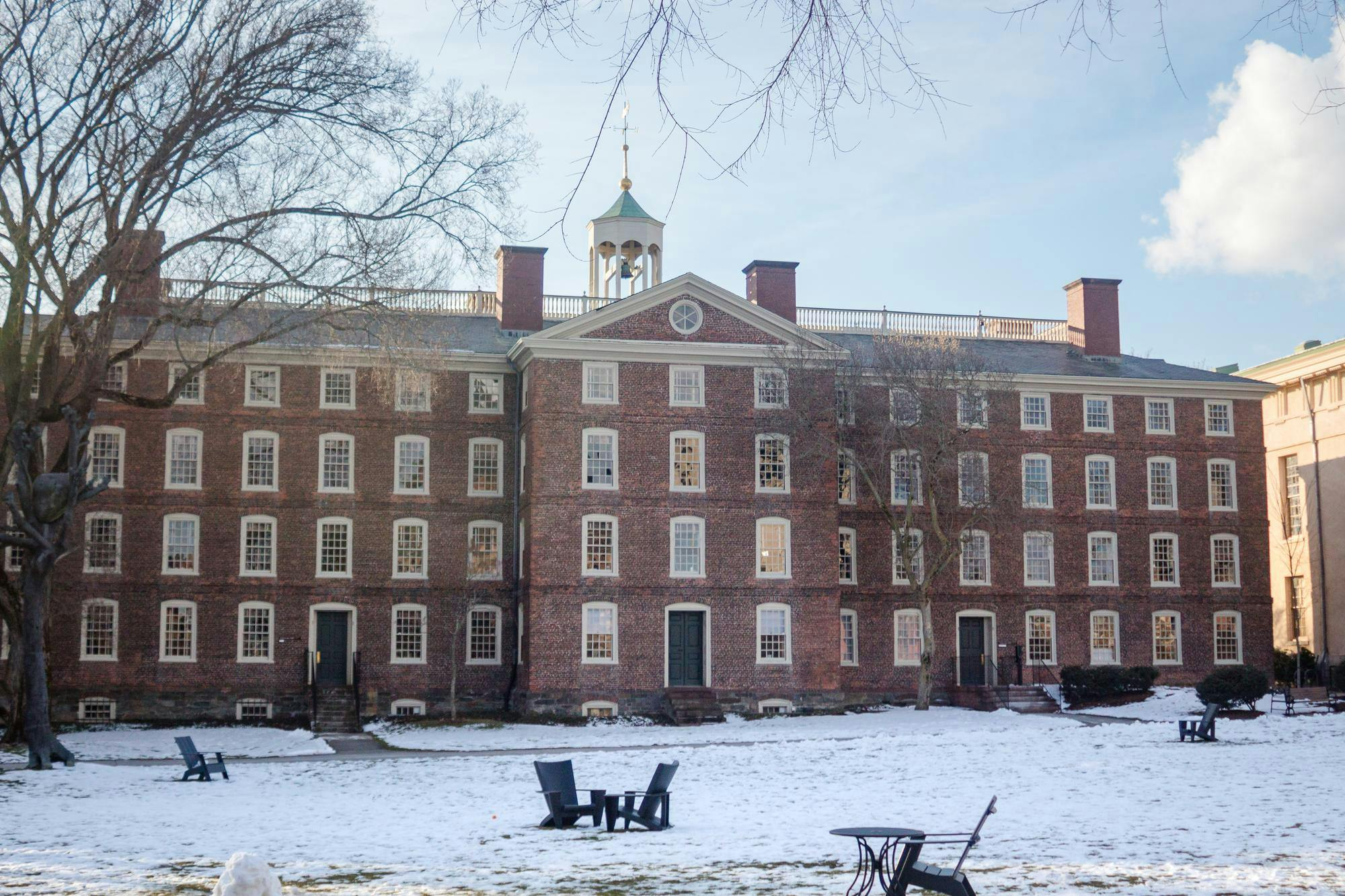 University Hall on a sunny and snowy day.