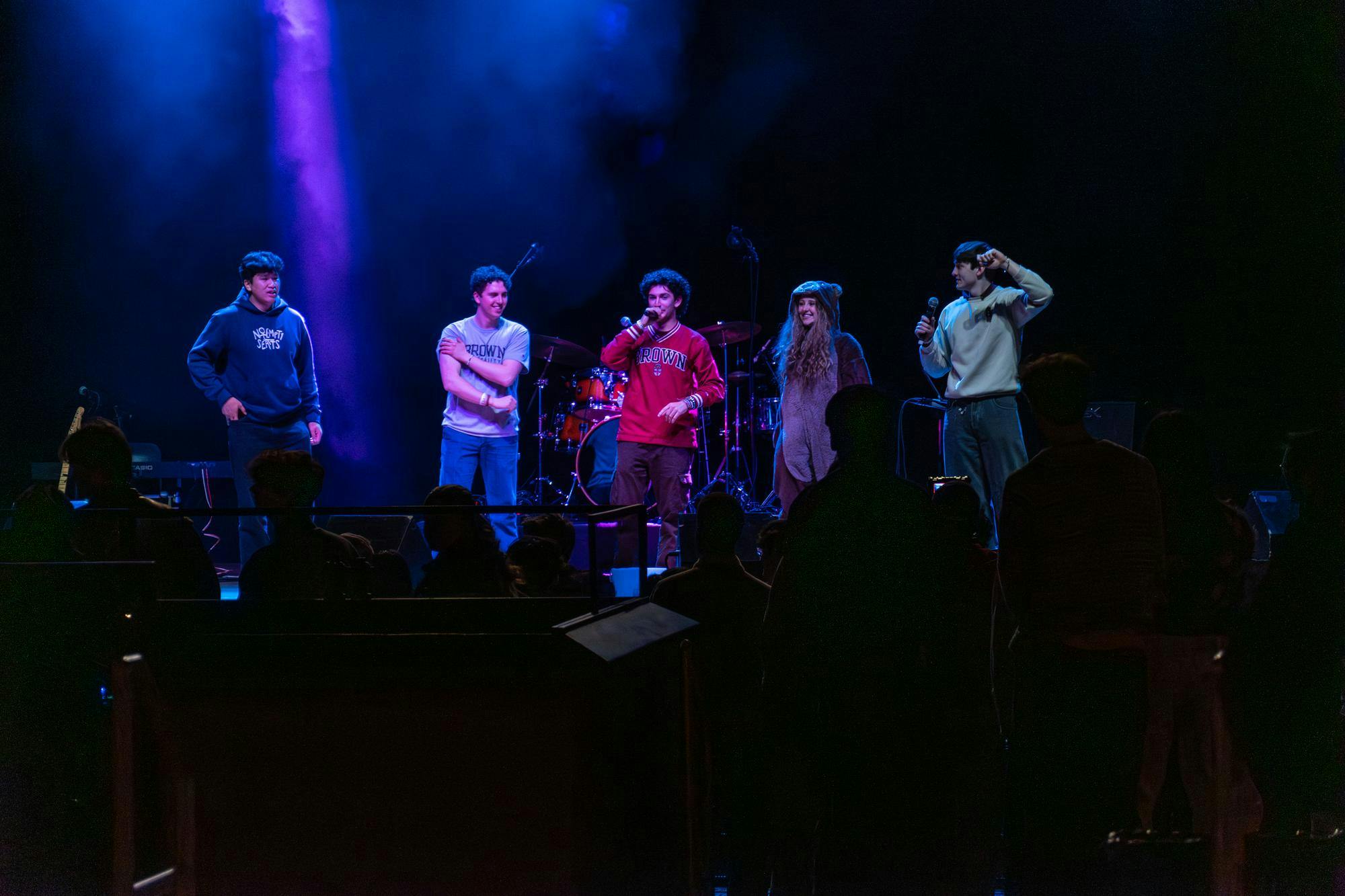 Pictured on stage are the emcees who organized and facilitated the event.