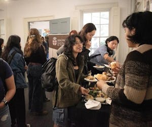 People gathering for the 50th year celebration of the Sarah Doyle Center
