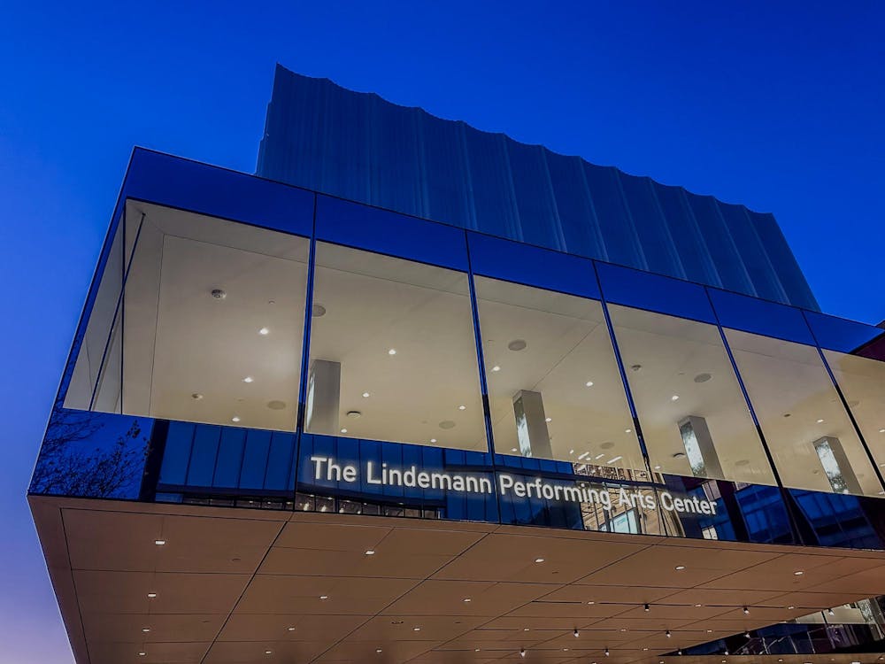 A photo of the Lindemann Performing Arts Center at twilight.