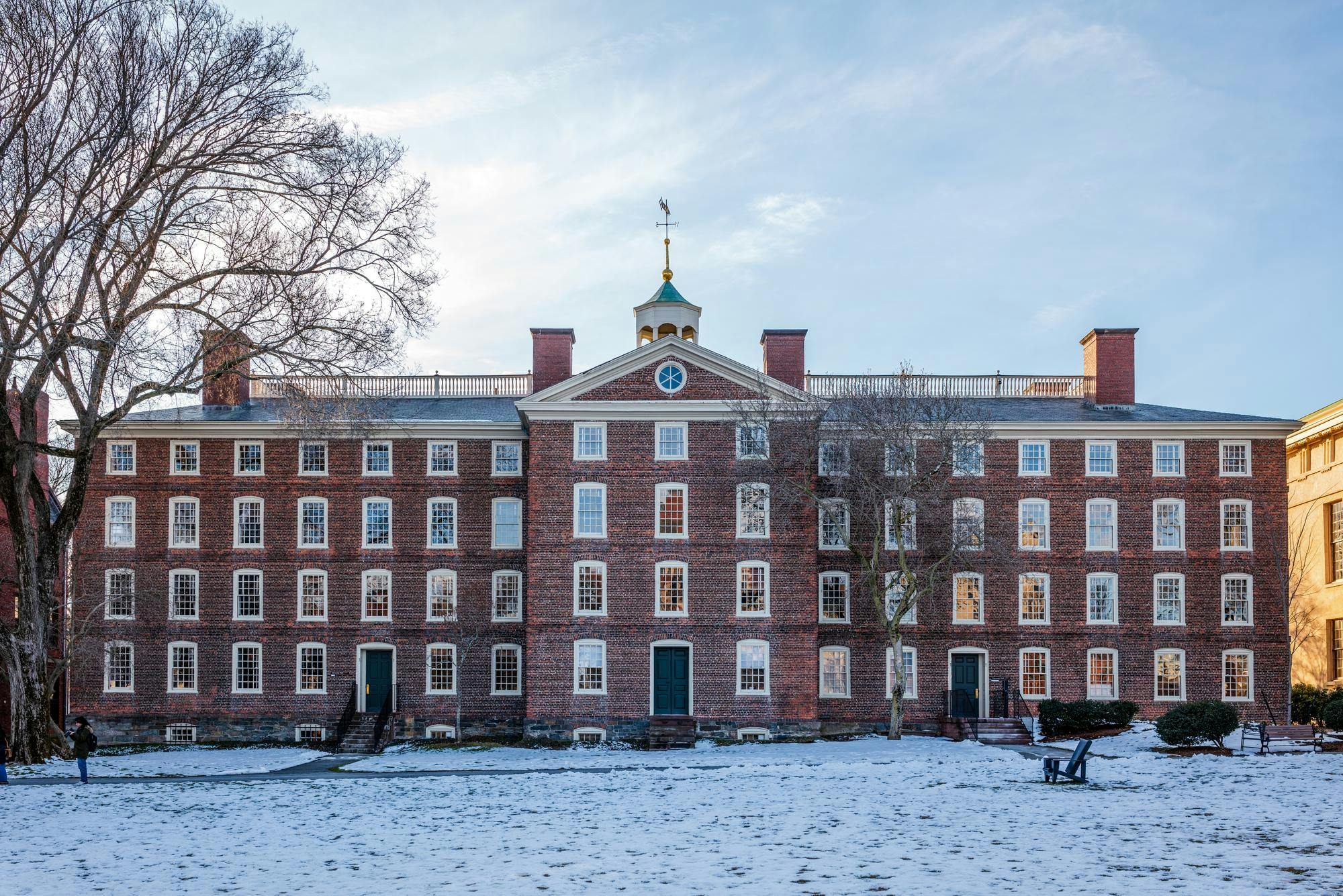 University Hall in the winter with snow on the Main Green.