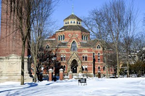 A photo of the front of Robinson Hall in the winter.