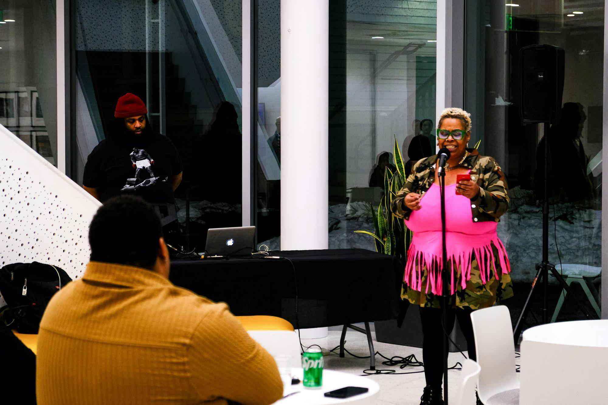 Tomasina Morris performs while Chachi Carvalho DJs.