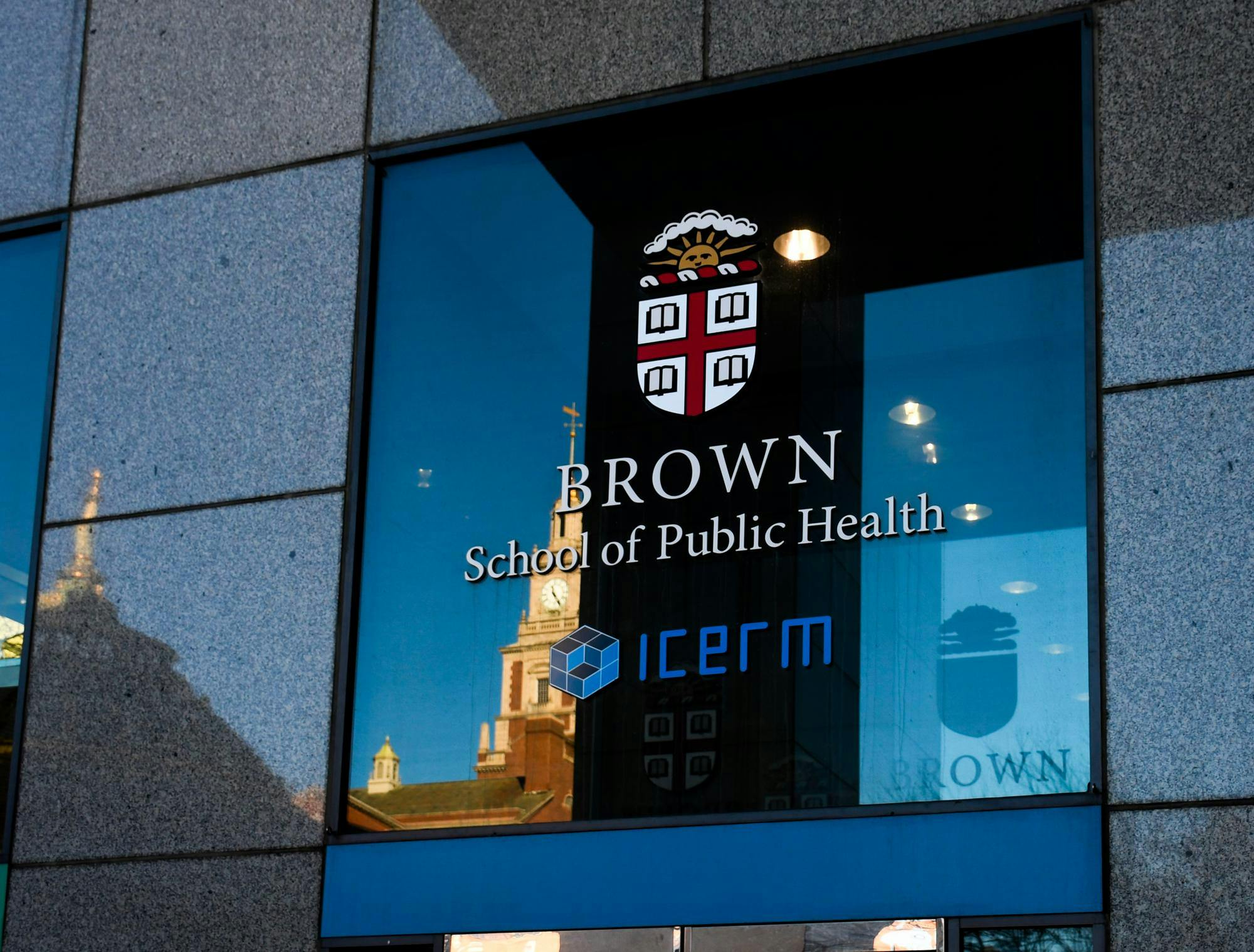A picture of the Brown School of Public Health logo on a window. Below the logo, the text reads "ICERM."