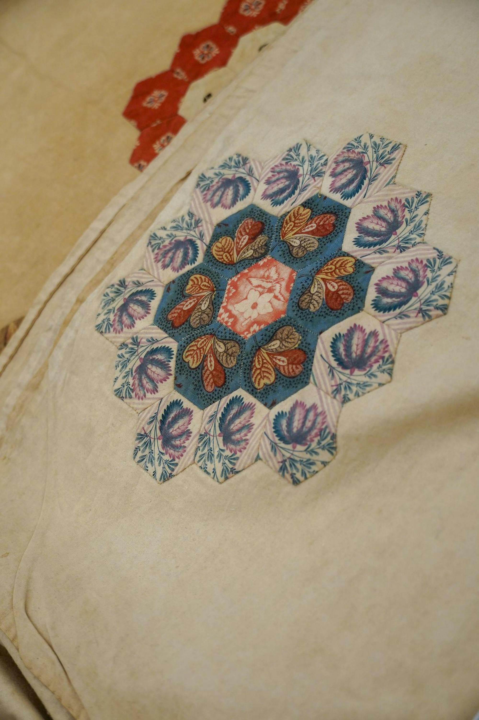 An exquisite embroidery with flowers on it.