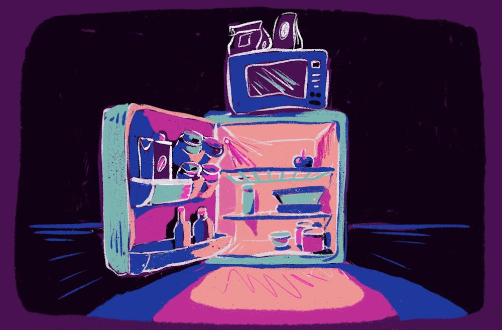An illustration shows an open minifridge glowing in the dark, with food and drink inside and a microwave on top.

