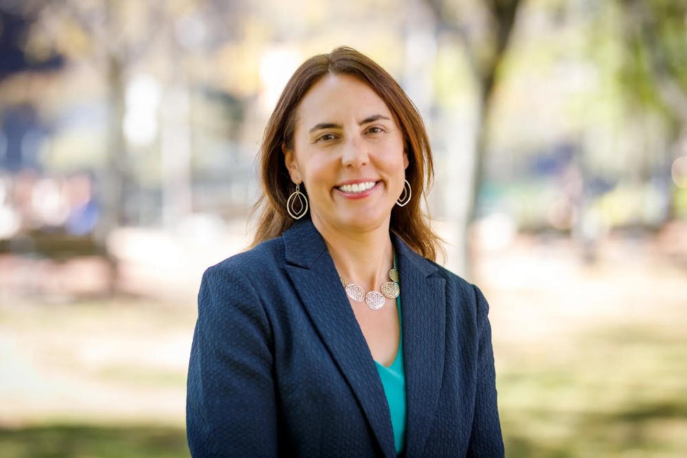 Photo of Francesca Beaudoin in a navy suit jacket.

