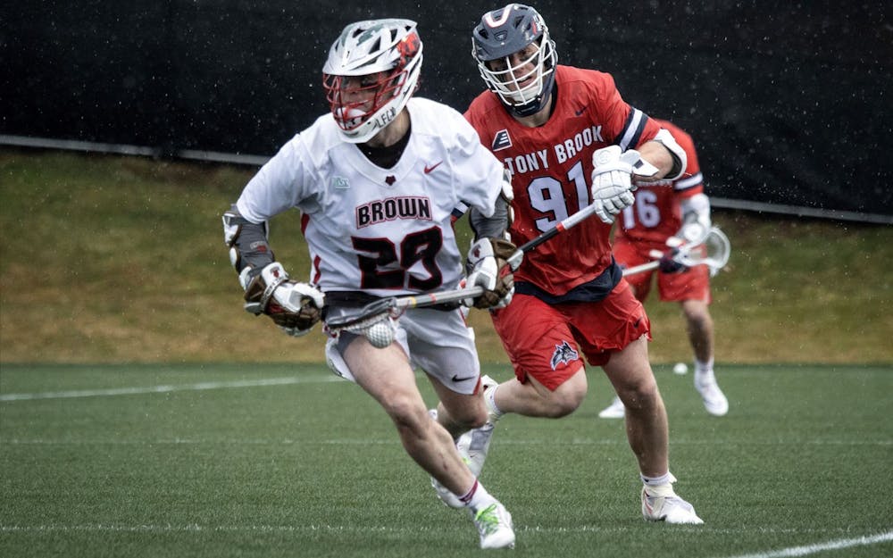 <p>Within the first 39 seconds of the game, attacker Darian Cook ’22 scored a goal, but a few minutes later Stony Brook midfielder Mike McMahon scored his team’s first goal and evened out the score.</p><p>Photo Courtesy of Tamar Kreitman, Brown Athletics</p>