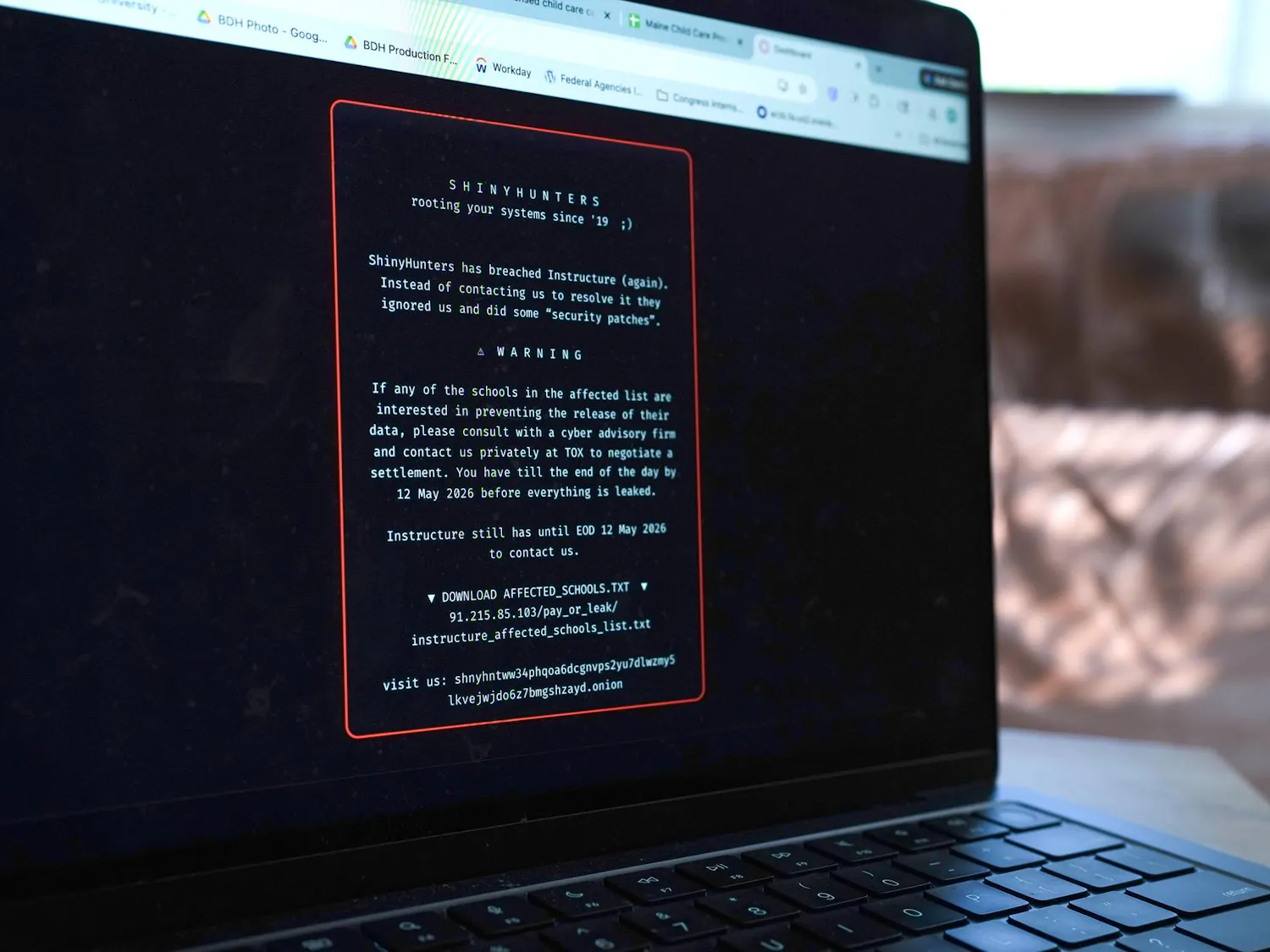 Image of a laptop displaying the ransom note.