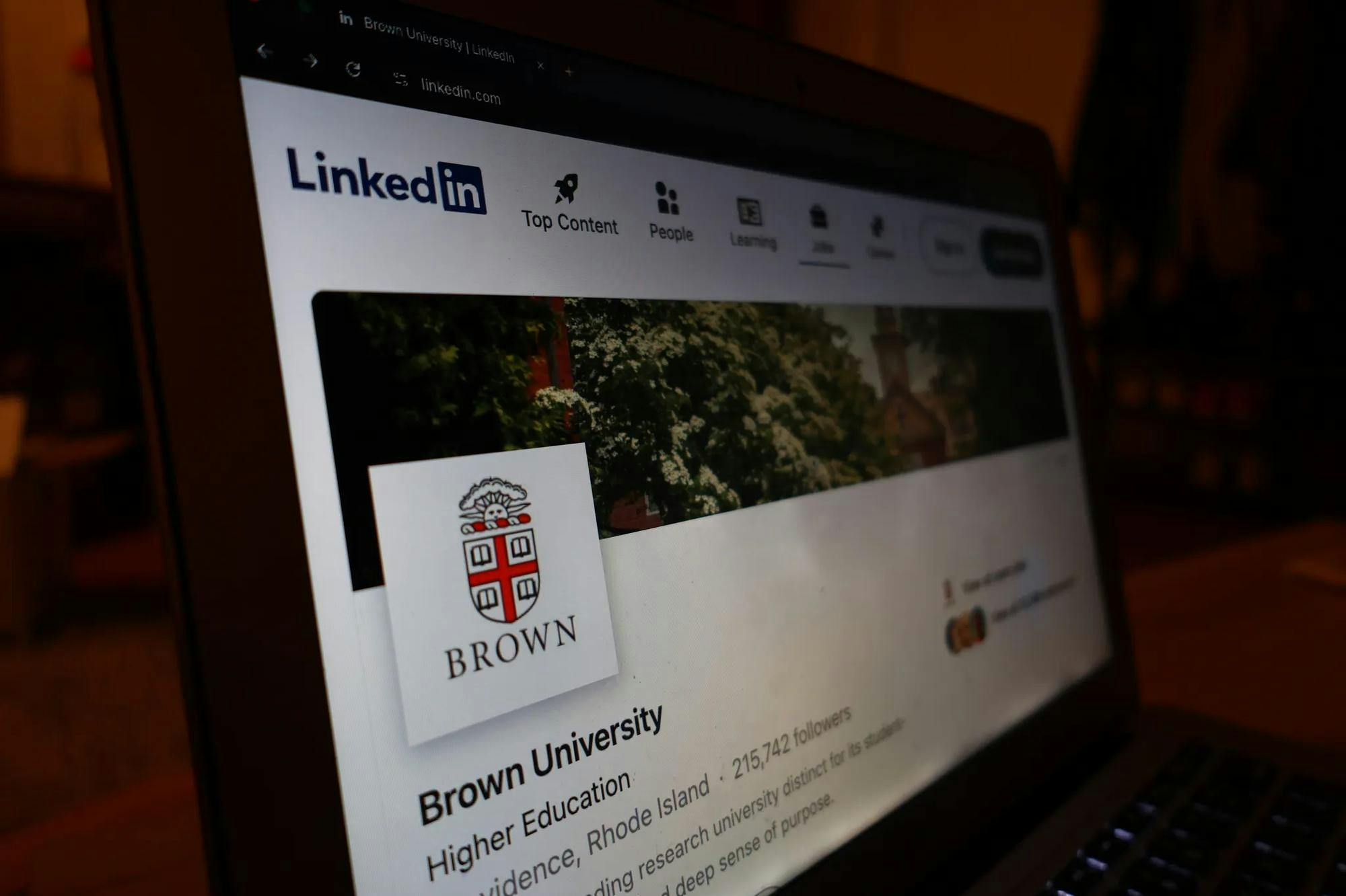Photograph of the Brown University Linkedin page on a laptop screen.