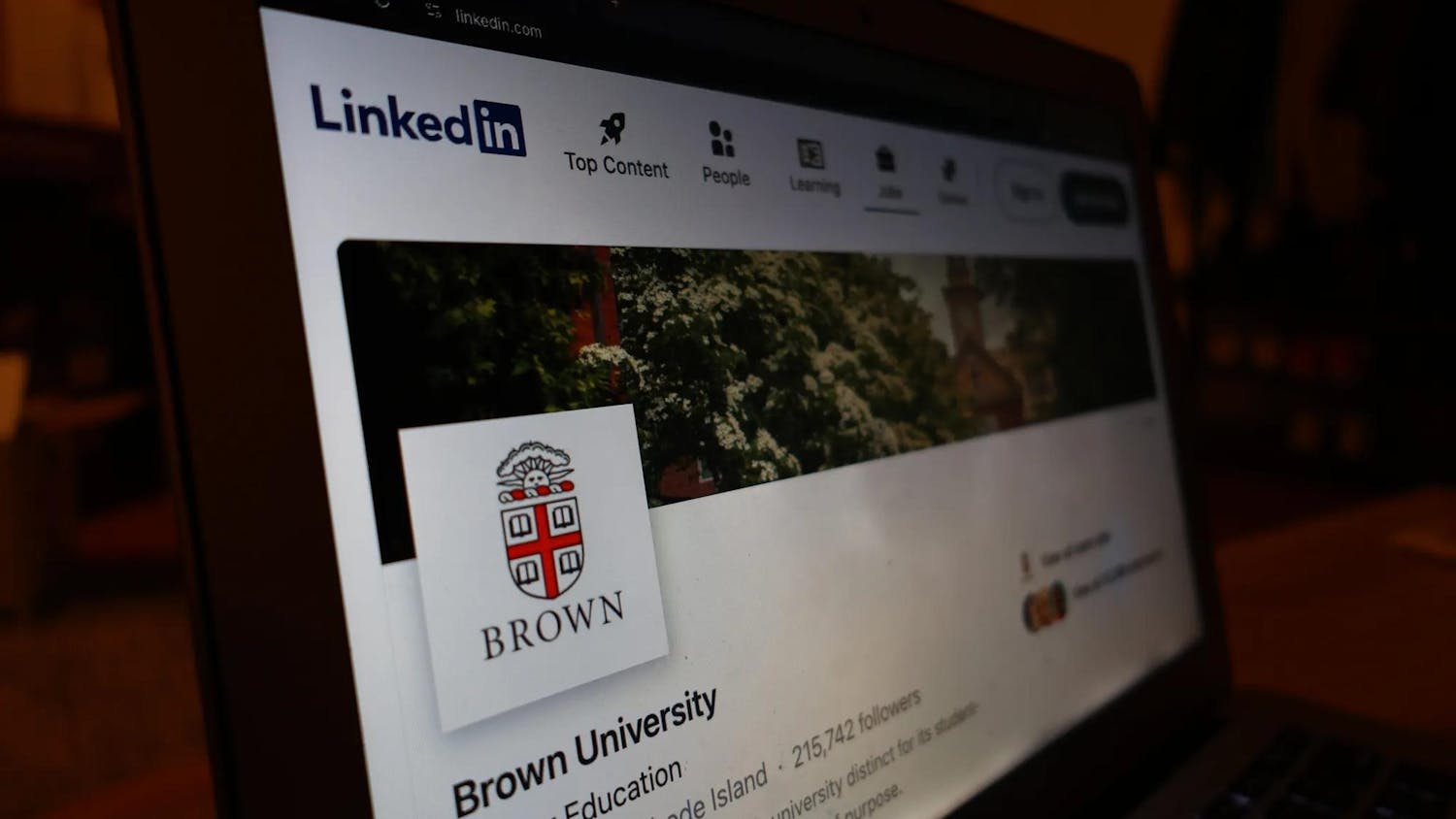 Photograph of the Brown University Linkedin page on a laptop screen.