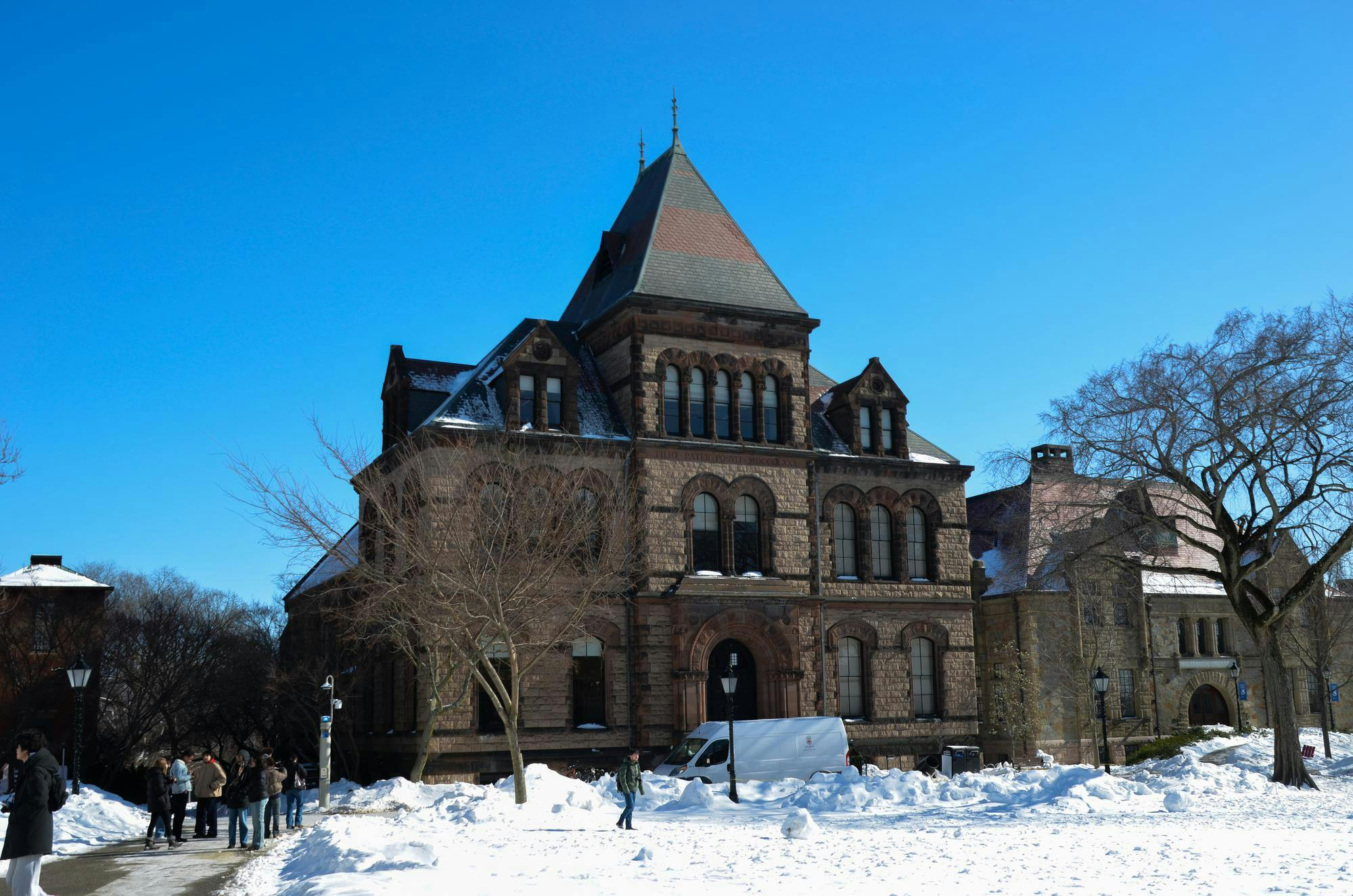 Photo of Sayles Hall on the Main Green covered in snow.