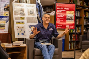 Photo of Alejandra Arteaga seated giving his talk
