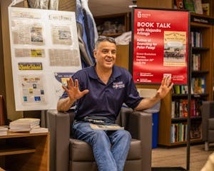 Photo of Alejandra Arteaga seated giving his talk