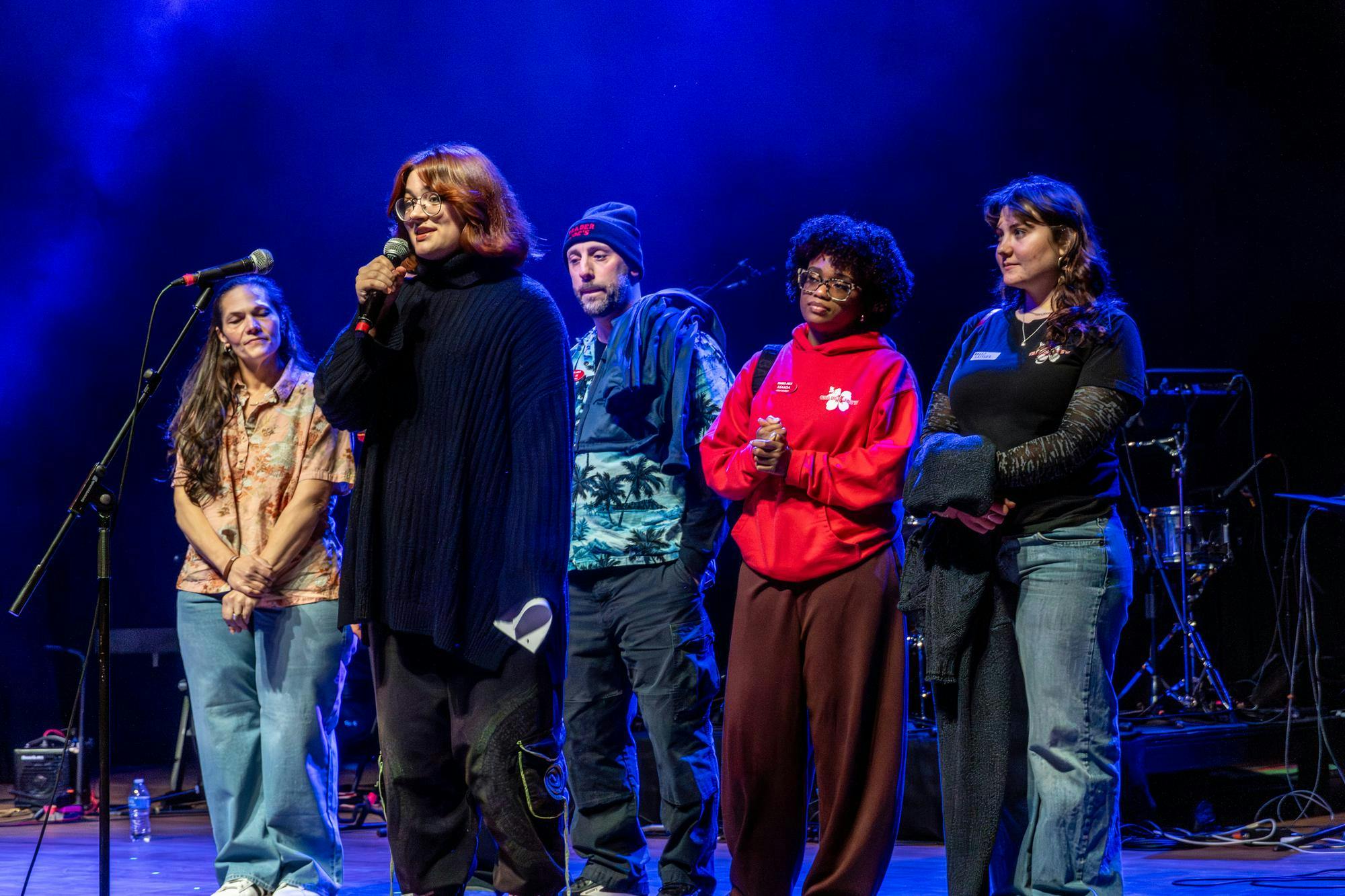 Pictured on stage are Trader Joe's employees and a student who was at the store during the shooting.
