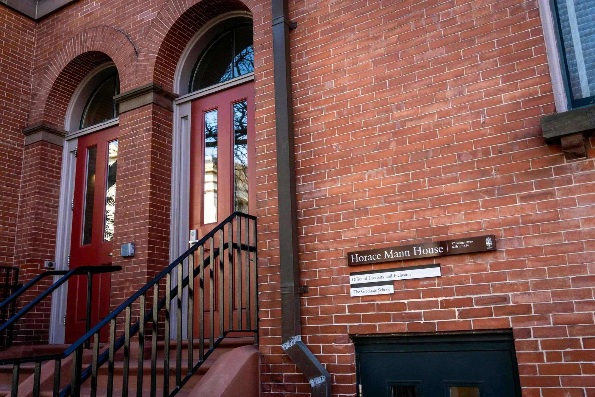 Two doors at the entrance of the Horace Mann House on George Street.  