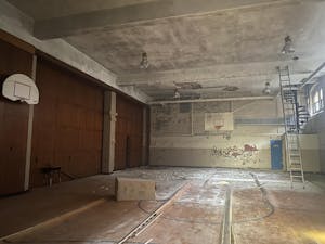 One of the school's gymnasiums will likely be converted into a functional gym for future residents in the apartments.