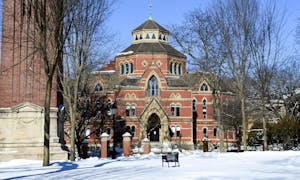 A photo of the front of Robinson Hall in the winter.