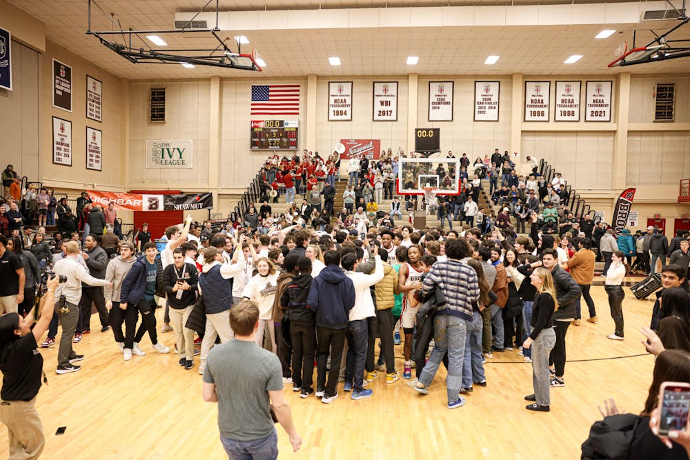 <p>At the sound of the final buzzer, students stormed onto the court to celebrate with the players.</p><p>Jimmy Picerelli via Brown Athletics</p>